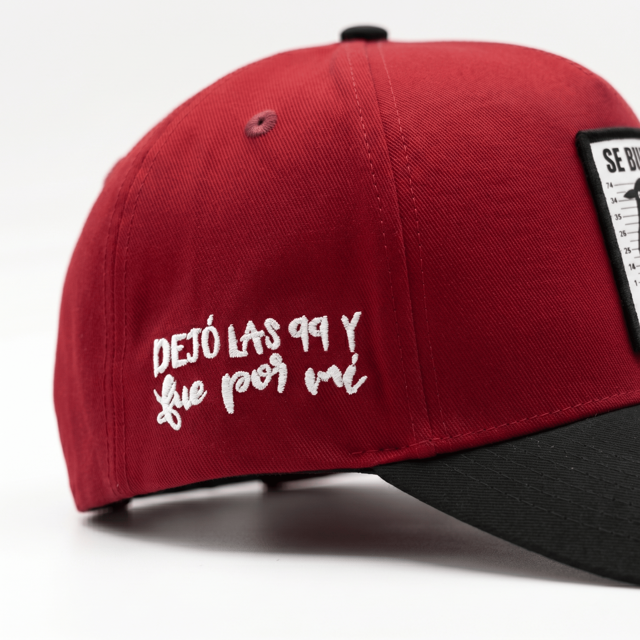 Side embroidery on red cotton hat
