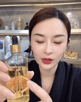 Ginseng Polypeptide Anti-Aging Essence bottle with ginseng inside