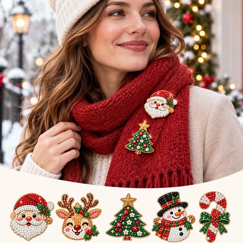 Santa and Christmas tree brooches pinned to a red scarf