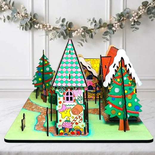 Painted house with trees on the village base board