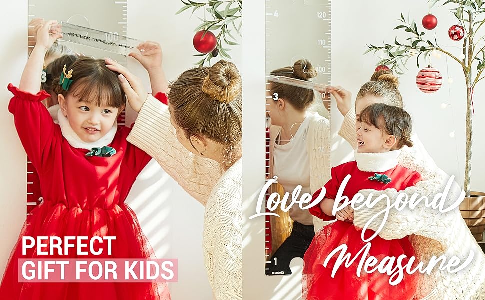 Perfect gift for kids, toddler girl is measuring her height, smiling with mom, growth mirror decor