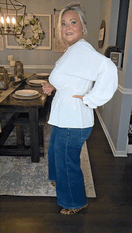 Animated wearing demonstration of the white fitted V neck blouse