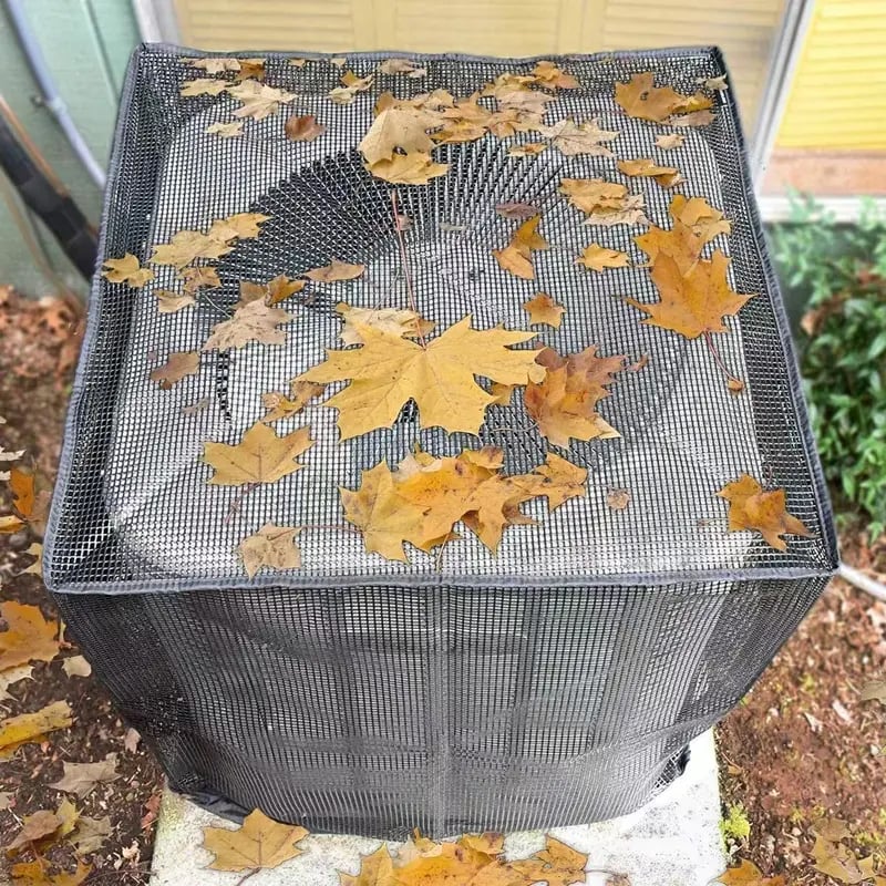 AC condenser mesh cover protecting against leaves and debris